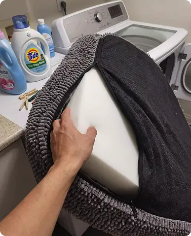 Remove the inner cushion insert before washing.